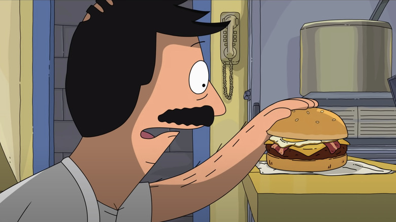 Bob Belcher talking to a burger in The Bob's Burgers Movie