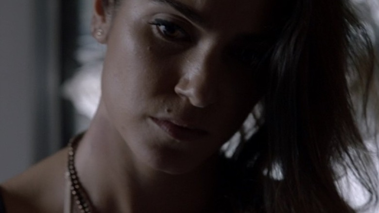 Nikki Reed looking down