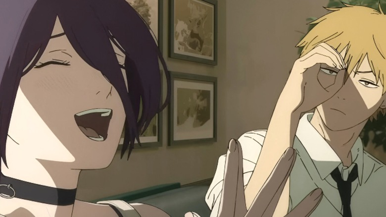 Reze laughs at Denji's jokes while he looks on in Chainsaw Man - The Movie: Reze Arc