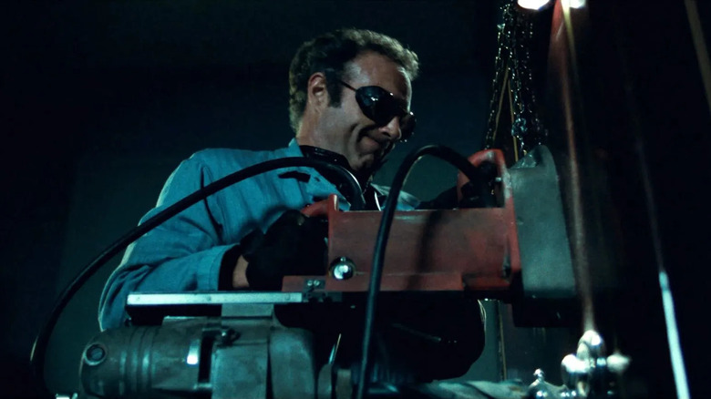 Thief James Caan drilling into safe