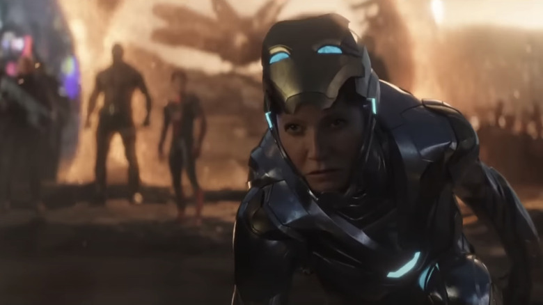 Gwynith Paltrow's Pepper Potts looks up as she lands in her Iron Man suit in Avengers Endgame