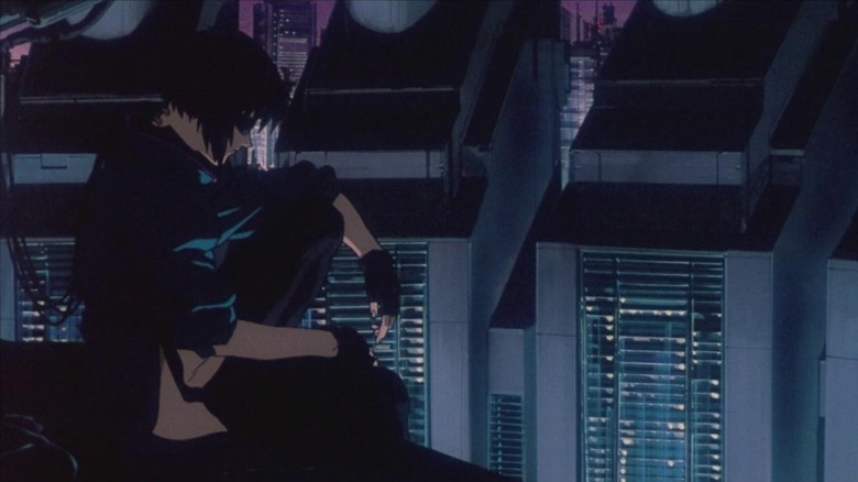 Motoko looks at the city in Ghost in the Shell