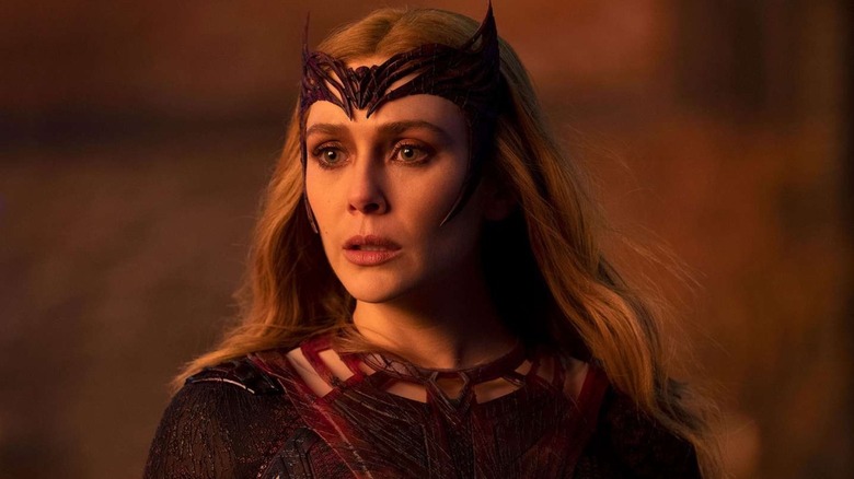 Elizabeth Olsen as Wanda Maximoff wearing her hood in Doctor Strange in the Multiverse of Madness