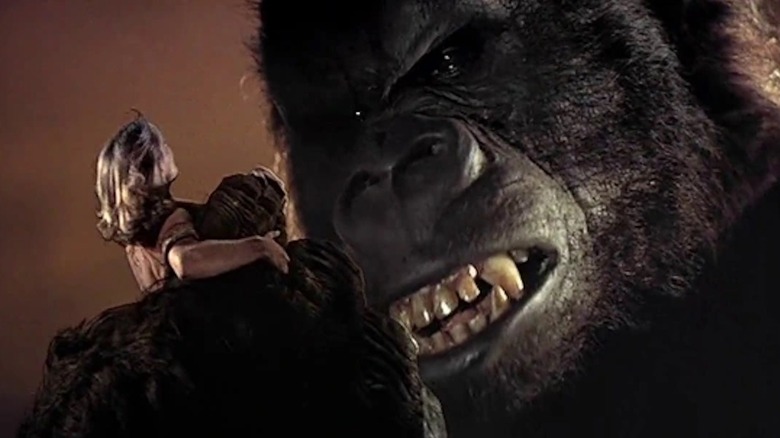 King Kong holds Jessica Lange as Dwan in his grasp in King Kong