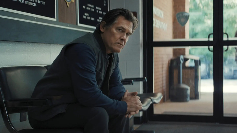 Archer Graff sits in the police station in Weapons