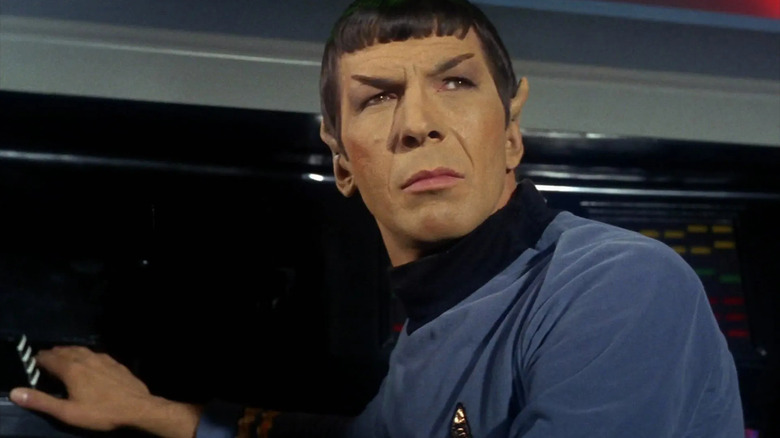 Spock looking up warily in Star Trek: The Original Series
