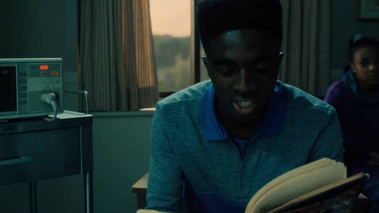 Caleb McLaughlin reading The Talisman in Stranger Things Season 4