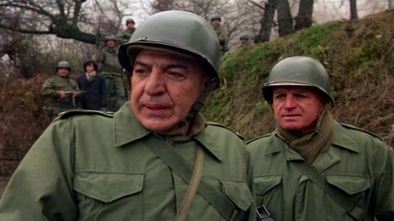 Major Wright and another soldier in a helmet in The Dirty Dozen: The Deadly Mission