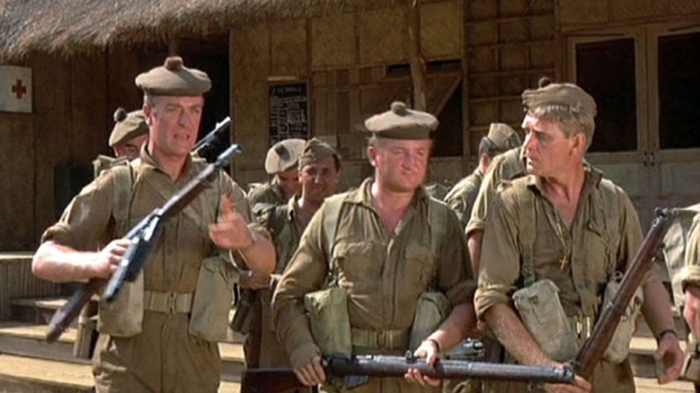 Private Hearn and two British soldiers in Too Late the Hero