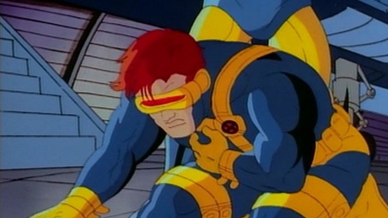Cyclops on the floor at Wolverine's feet in X-Men: The Animated Series