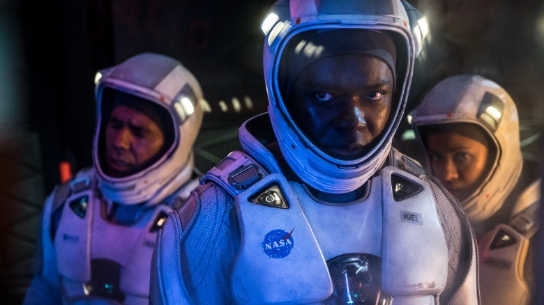 Elizabeth Debicki stuck in wall in The Cloverfield Paradox