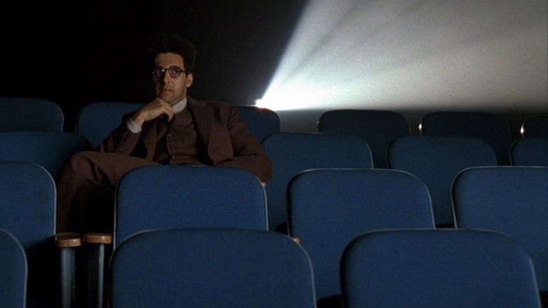 John Turturro's Barton Fink watches a movie in Barton Fink