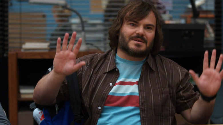 Buddy (Jack Black) raising his hands in Community