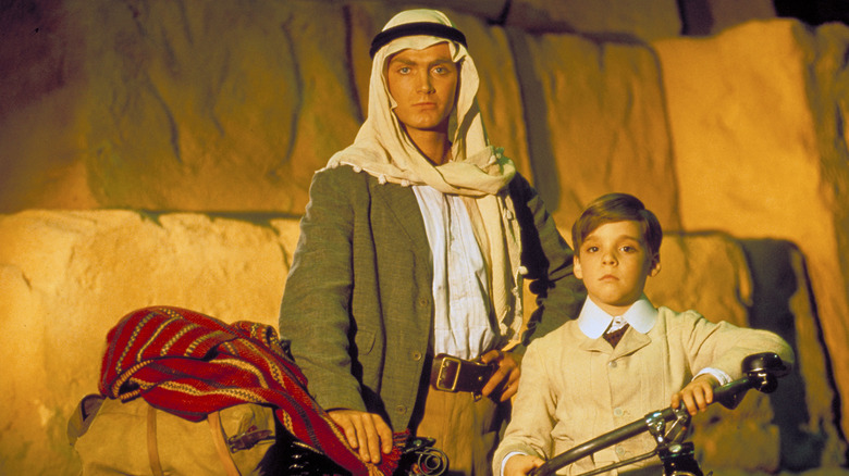 Lloyd Owen and Corey Carrier as Henry Jones Sr. and Jr. in a temple in The Young Indiana Jones Chronicles