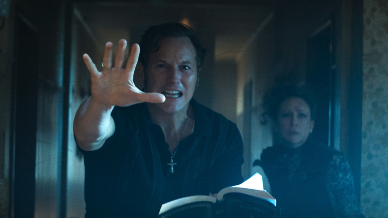Ed and Lorraine confronting a demon in The Conjuring: Last Rites