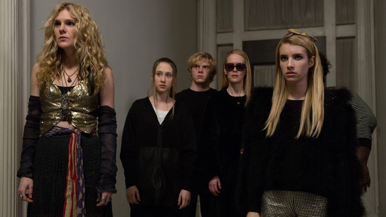 A group of scared teens in a hallway in American Horror Story