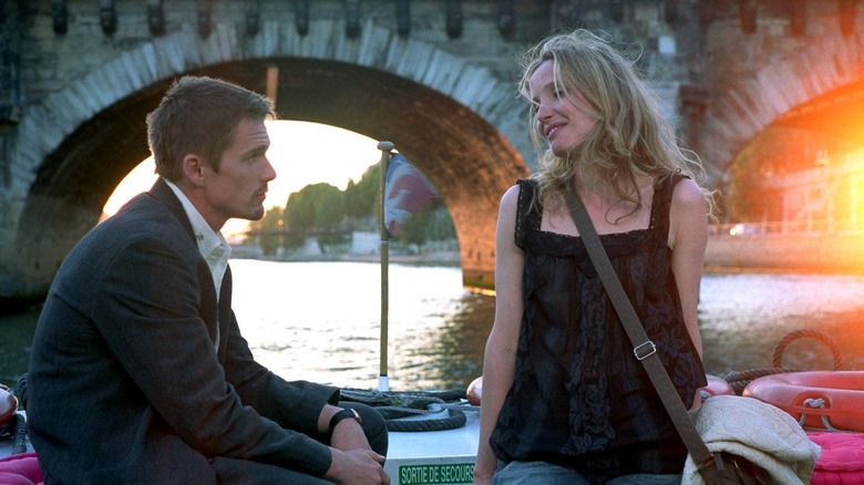 Jesse and Celine on a boat in Paris before sunset