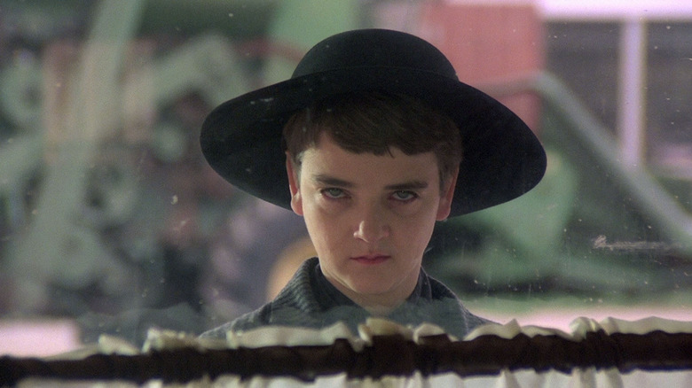 Weird kid with hat in a Children of the Corn movie