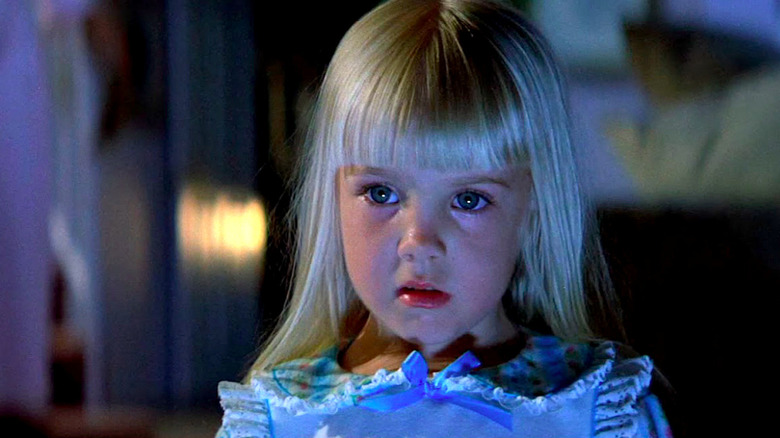 Carol Anne staring at the TV in the middle of the night in Poltergeist