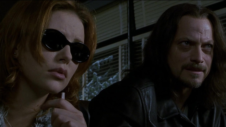 Charlize Theron as Ashley and Gary Sinise as Gabriel in Reindeer Games