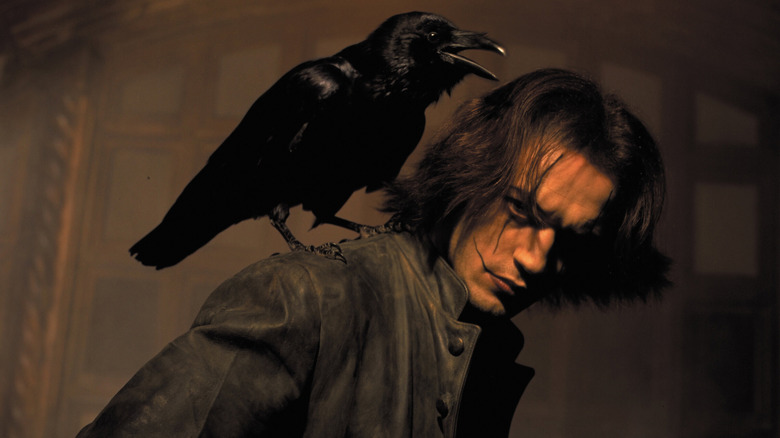 Ashe Corven with a crow on his shoulder in The Crow: City of Angels