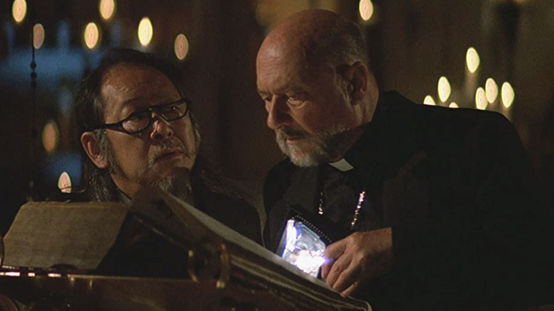 Donald Pleasence and Victor Wong in Prince of Darkness