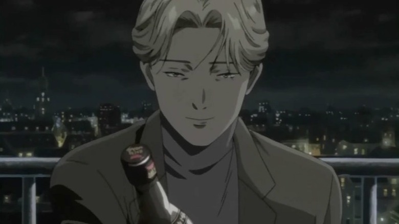 Monster Johan holding whiskey bottle