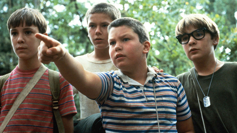 The young stars of Stand By Me flip a coin