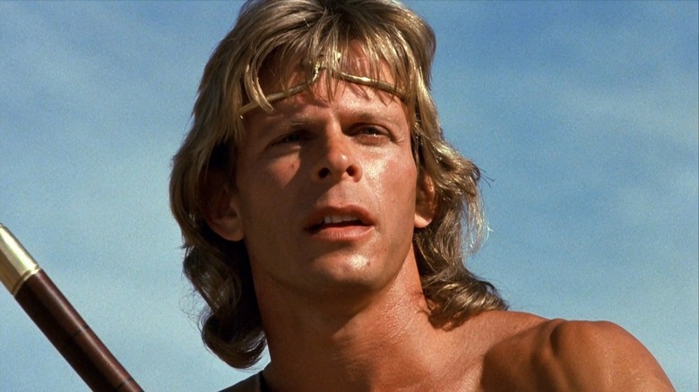 Marc Singer and his trusty black tiger in The Beastmaster