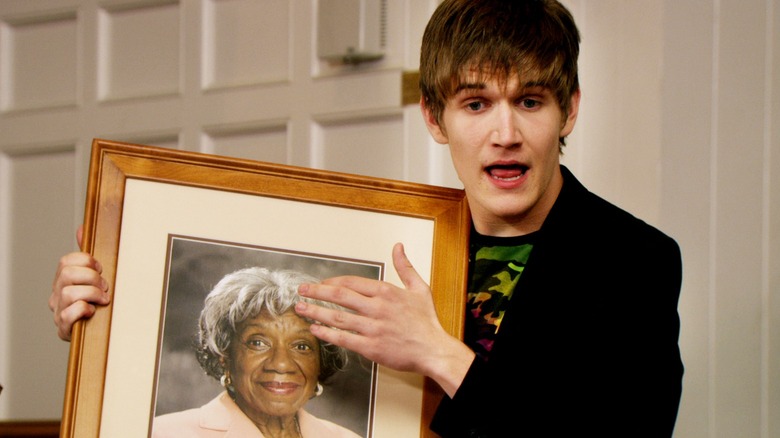 Zach Stone holds grandma photo
