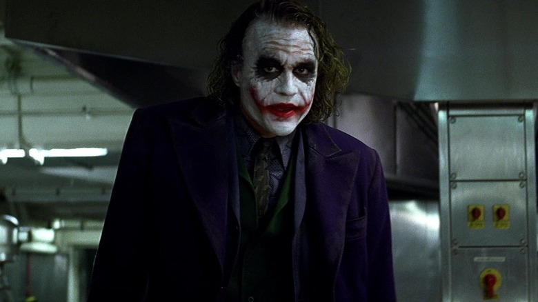 Heath Ledger's Joker stands in a kicthen in The Dark Knight.jpg