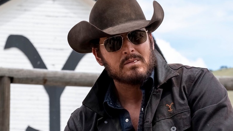 Cole Hauser cowboys up in a hat and shades as Rip Wheeler in Yellowstone