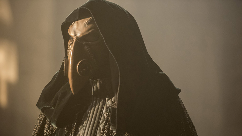 The ominous Doctor Alchemy, wearing a mask like a plague doctor's, in The Flash.