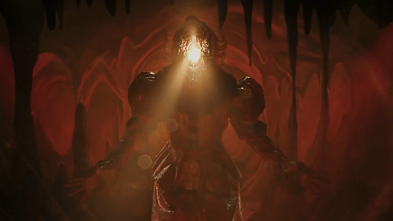 Bill Skarsgård's Pennywise rises from the floor as he reveals the Deadlights in It Welcome to Derry