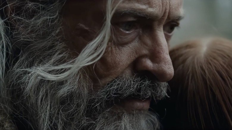 Robin looking pensive as he embraces someone in The Death of Robin Hood