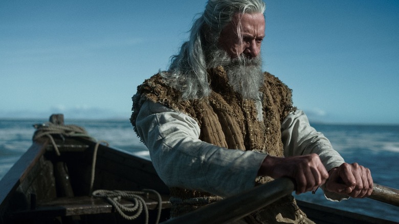 Robin Hood rows a boat in The Death of Robin Hood