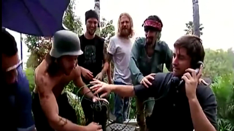 Luke Wilson (extreme right) is zapped by a field phone in a deleted scene from Jackass: Number Two