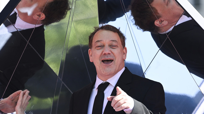 Sam Raimi in a photography mirror