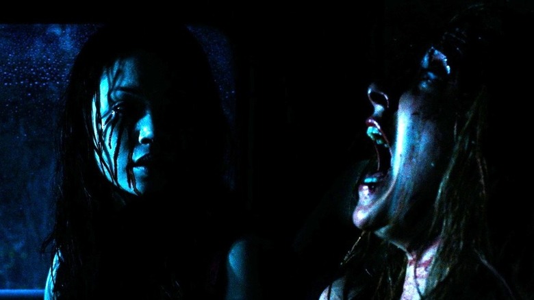 Sarah screaming near Juno's ghost in The Descent (2005)