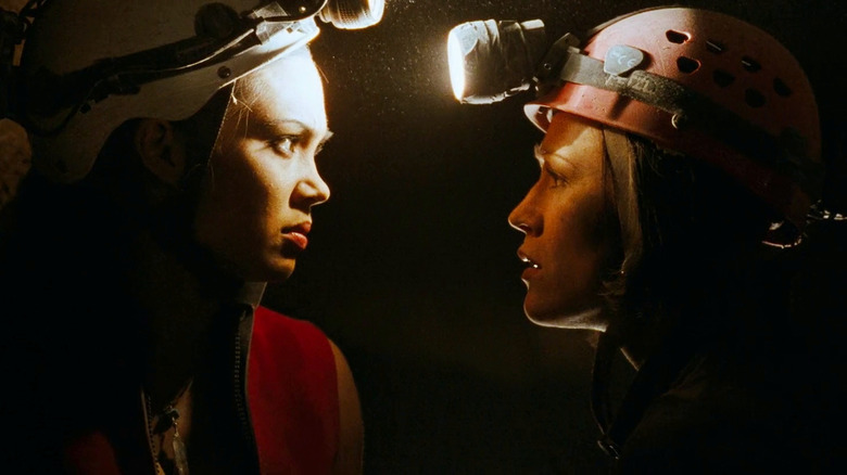 Natalie Mendoza and Alex Reid in The Descent