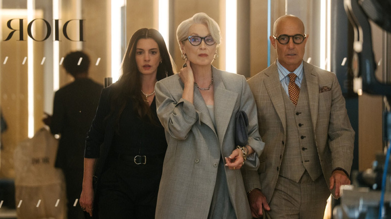 Miranda Priestly (Meryl Streep), Andy Sachs (Anne Hathaway), and Nigel (Stanley Tucci) leave Dior offices in The Devil Wears Prada 2