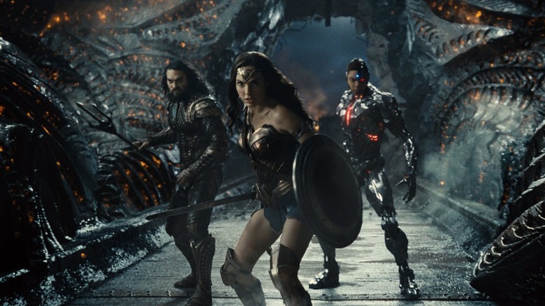 Aquaman, Wonder Woman, and Cyborg stand ready for battle in Justice League