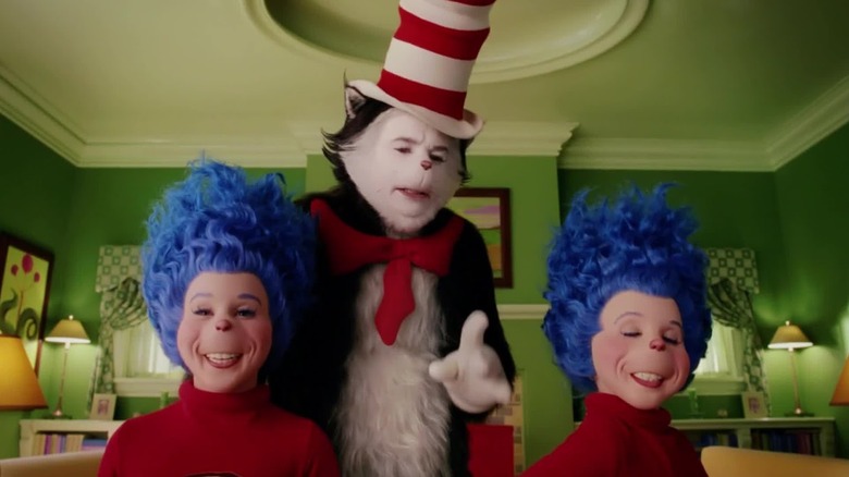 Cat in a hat between thing 1 and 2, which looks refined in the cat in the movie 