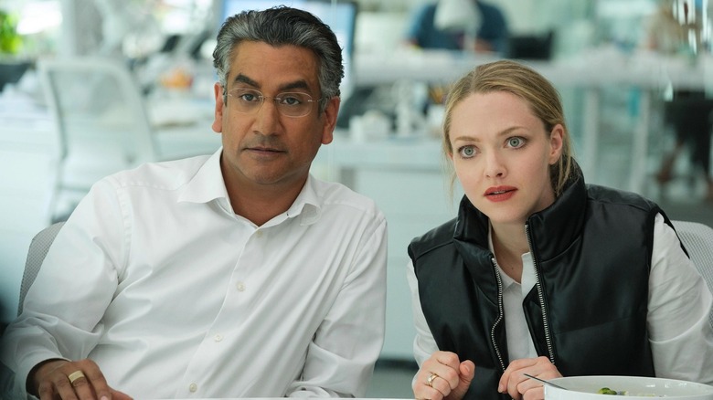 Naveen Andrews and Amanda Seyfried in The Dropout