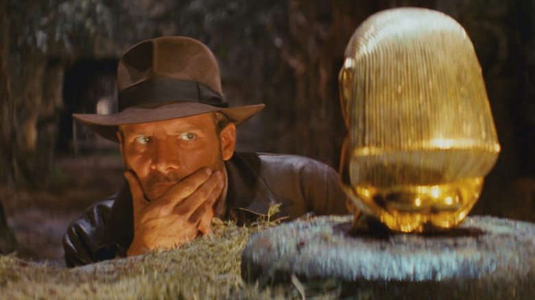 Indy evaluates the idol in Raiders of the Lost Ark