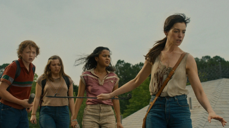 Brian, Audrey, and Jeannette wait for Denise to say it's safe in The End of Oak Street