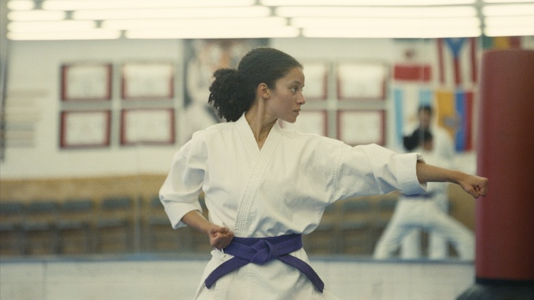Willa practicing karate at her dojo in in One Battle After Another