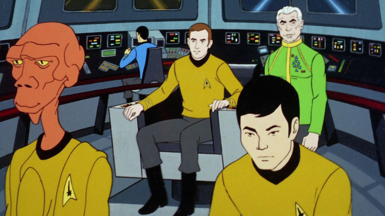 Aryx, Kirk, Robert April, and Sulu on the bridge of the Enterprise in Star Trek: The Animated Series