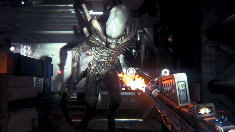 A Xenomorph advances at a flamethrower in Alien: Isolation