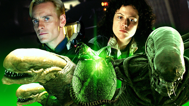 Michael Fassbender as David and Sigourney Weaver as Ellen Ripley stand over Xenomorphs